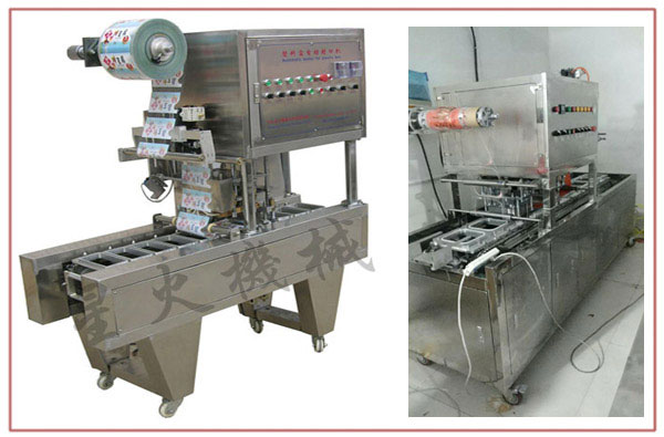 龍蝦灌裝封口一體機整機展示